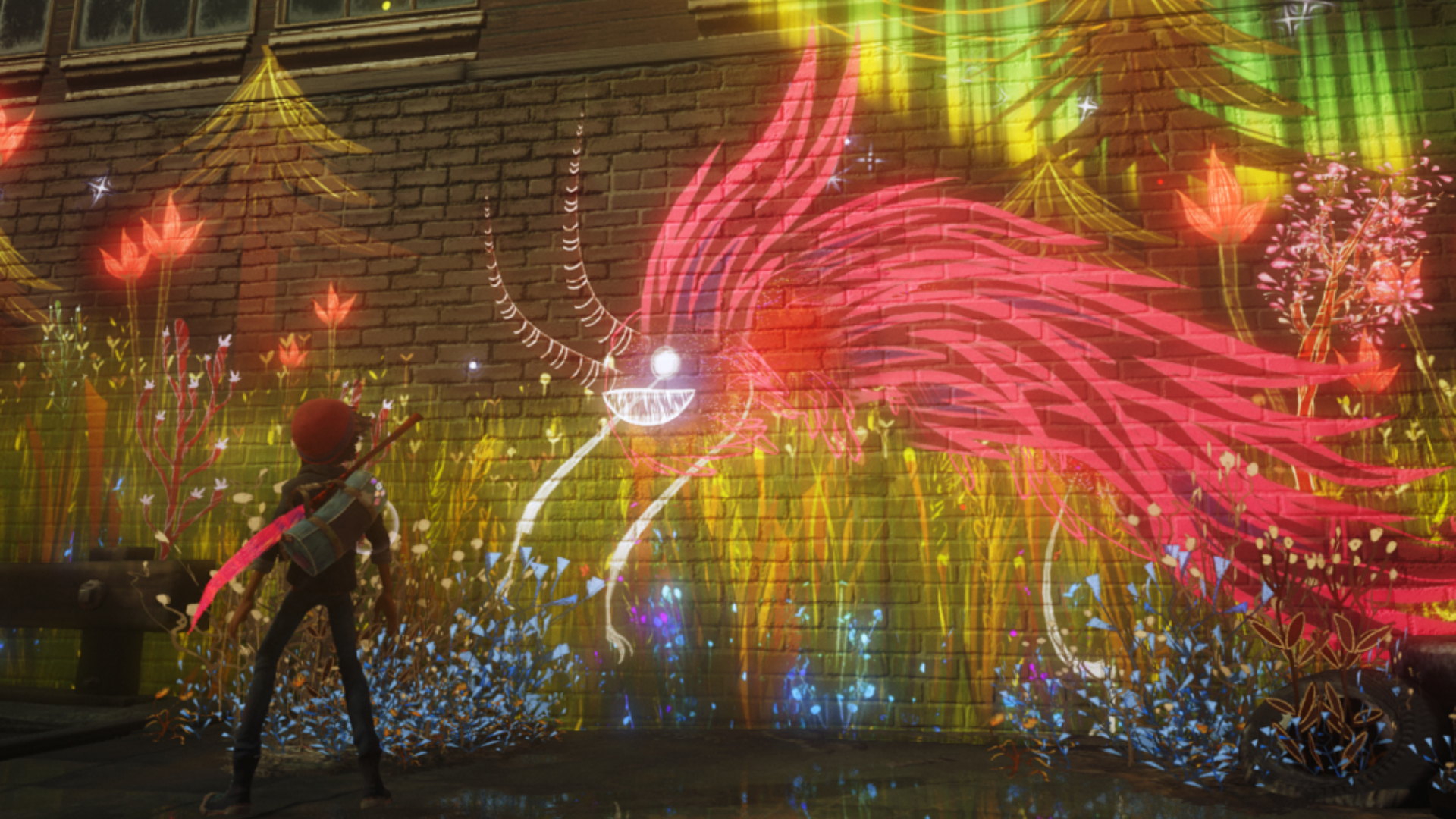 A boy looks at a colorful graffiti monster spray-painted on a brick wall.