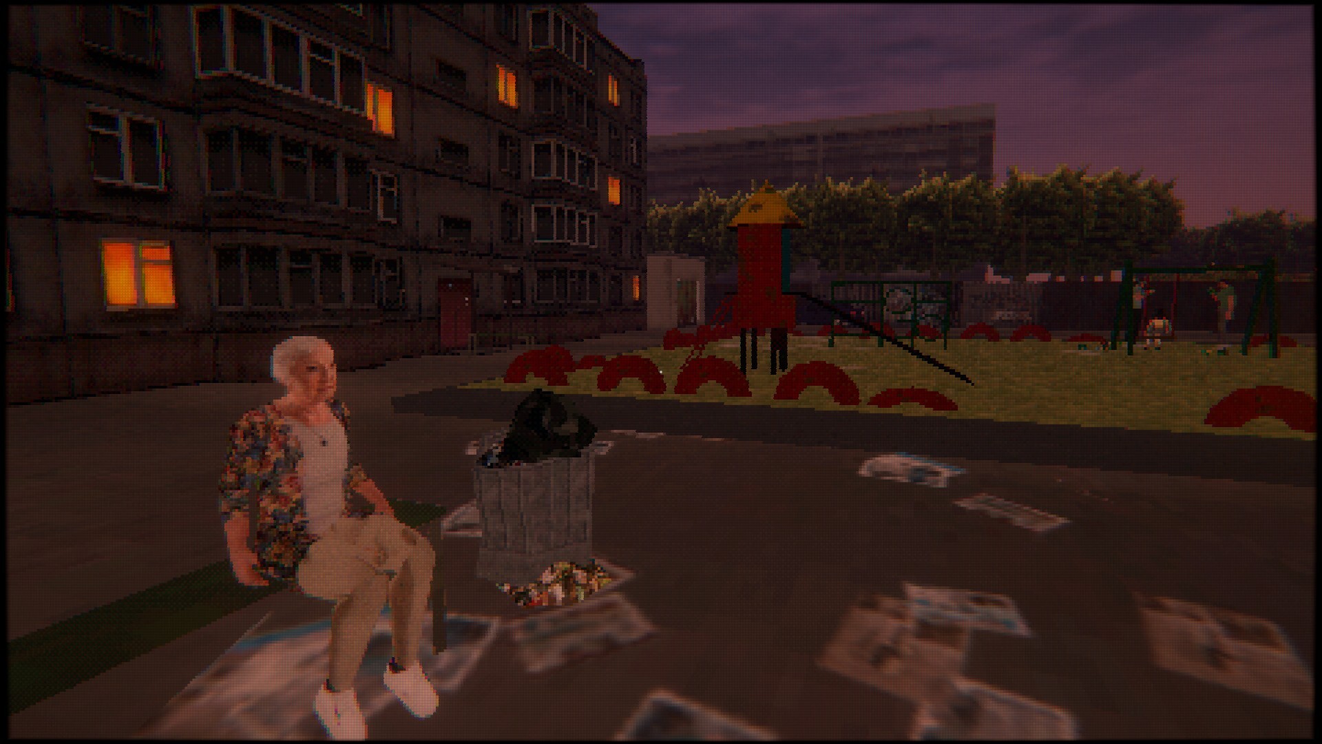 An old woman sits outside of a building near a playground.